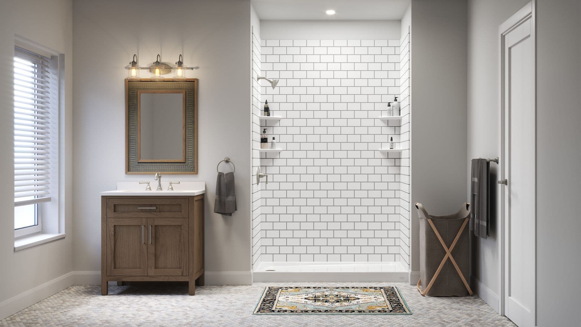 Modern bathroom with wood vanity, ornate mirror, three-light fixture, walk-in shower with subway tile, shelving, and woven laundry hamper.